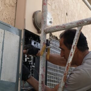 Electrician installing and upgrading an electrical panel in Los Angeles, CA.