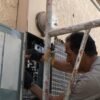 LAProElectrical worker performing a full panel upgrade for a remodeling property in Los Angeles, CA.