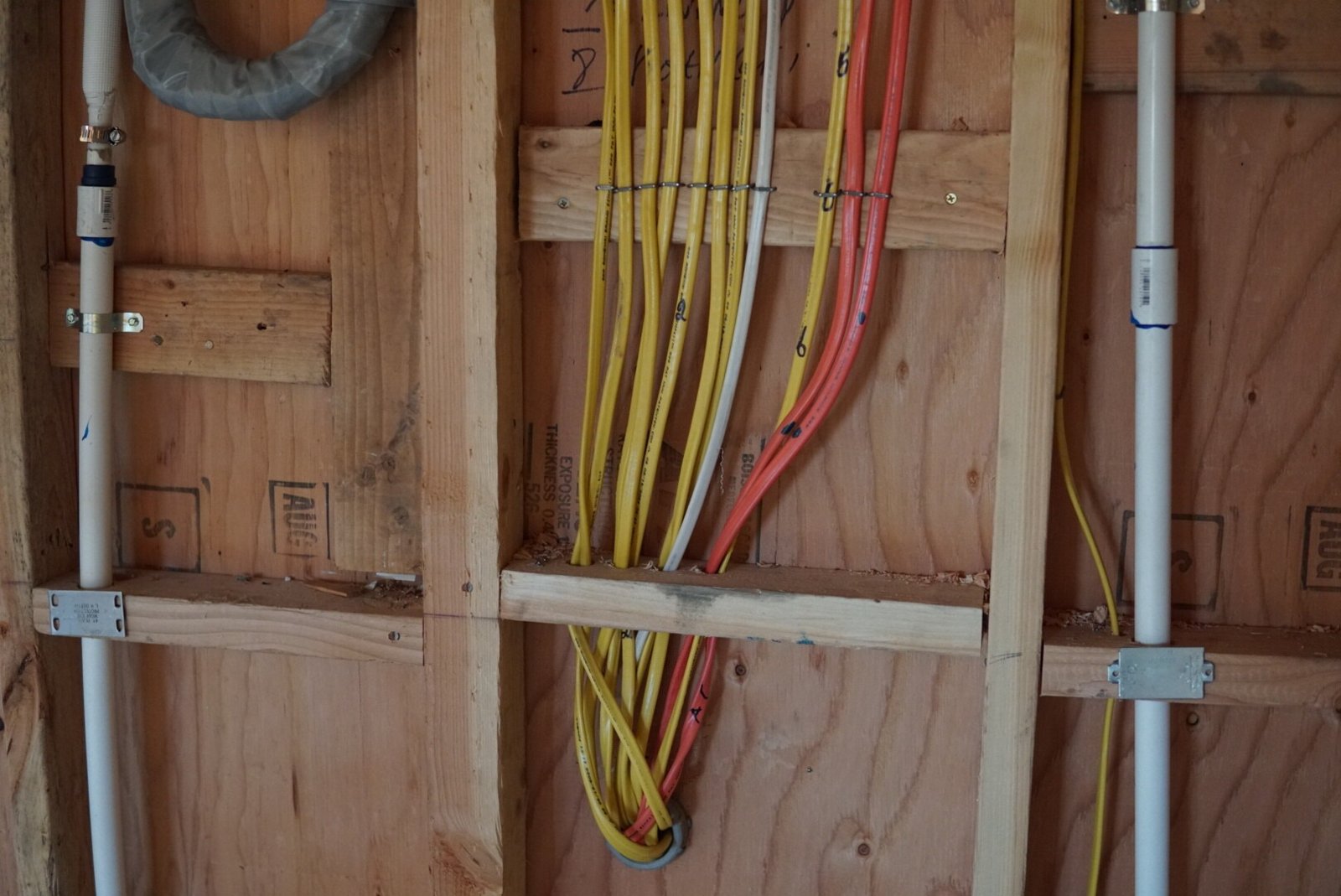 Electric install with wires being professionally run to the main panel of a residential house by LAPro Electrical.