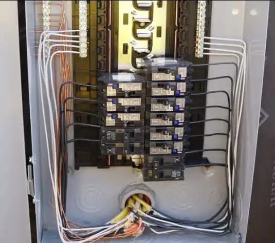 Residential electrical panel installation with upgraded wiring and circuit breakers.